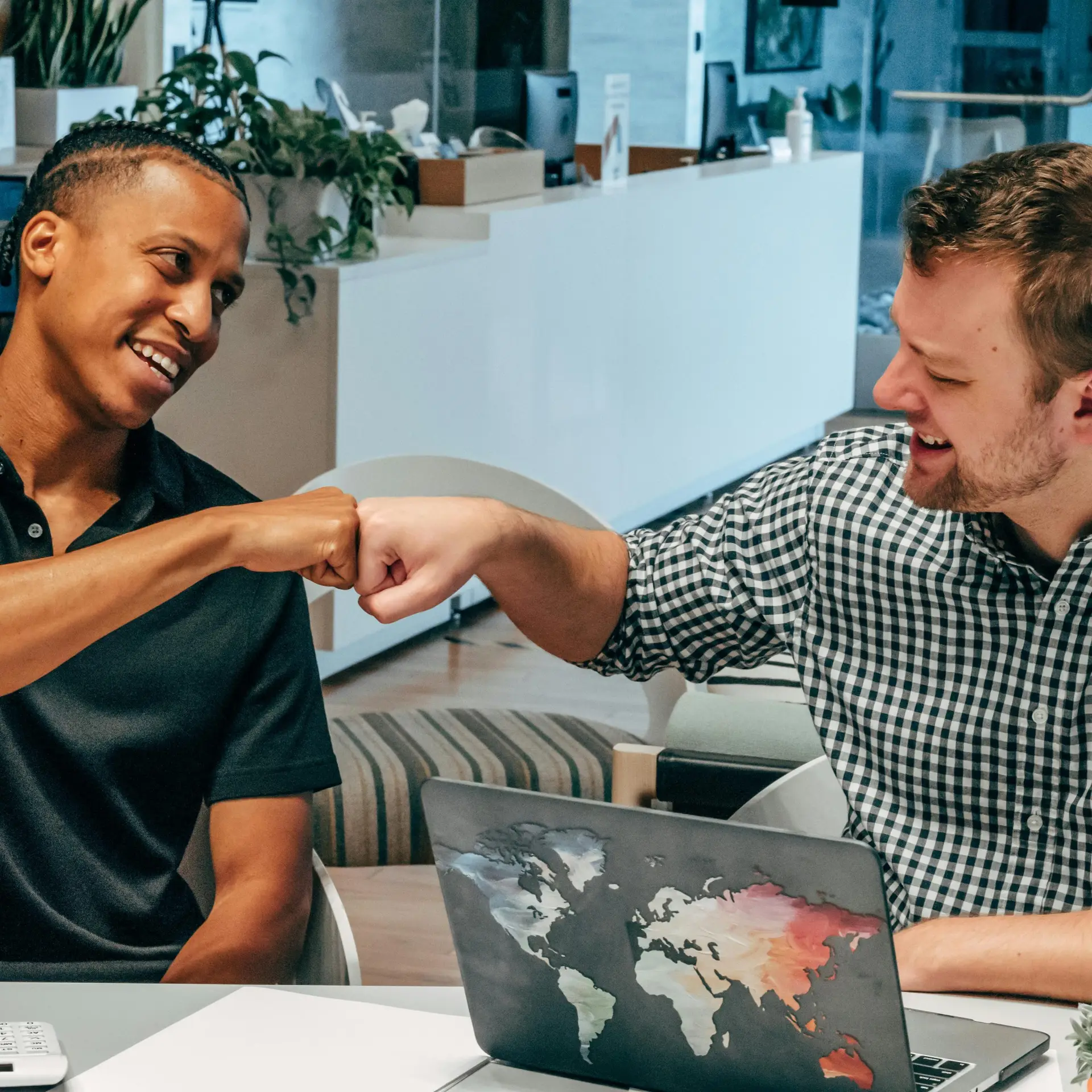 Tourifique team collaborating